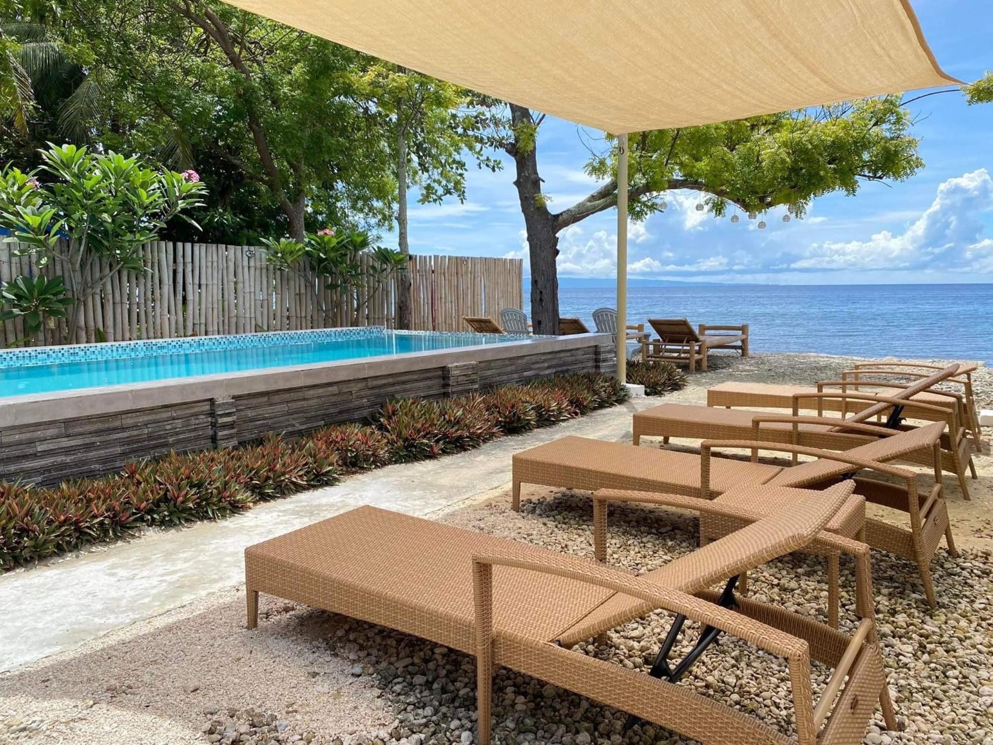 Southseas Beach Resort And Dive Center Santander Exterior photo